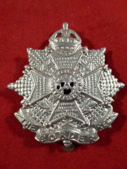 Original British Army Kings Crown The Border Regiment Cap Badge.