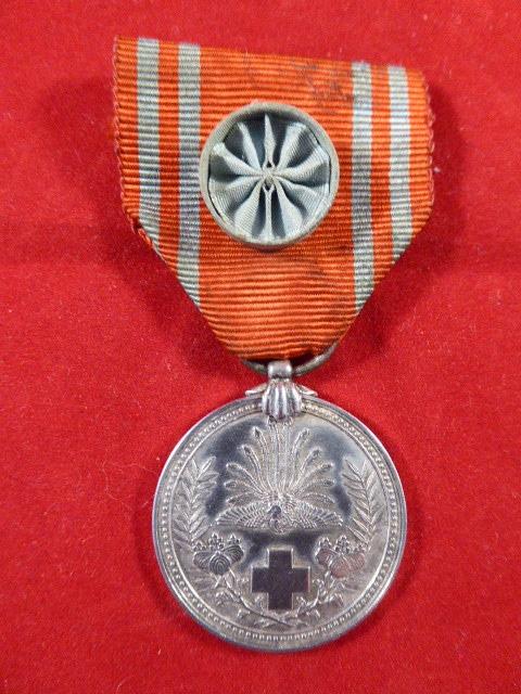 Early Silver Japanese Red Cross Medal with Rosette on the Riband circa 1930’s