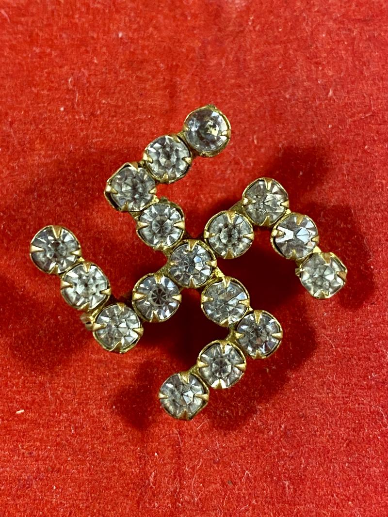 Antique Swastika Brooch made with Faux Diamonds Set in Gilt Metal c1890.