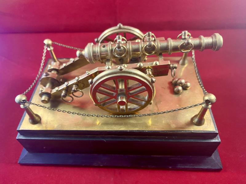 Finely Detailed Brass Model of a Field Cannon with Rear Wheel on Black Painted Rectangular Wooden Plinth c1960