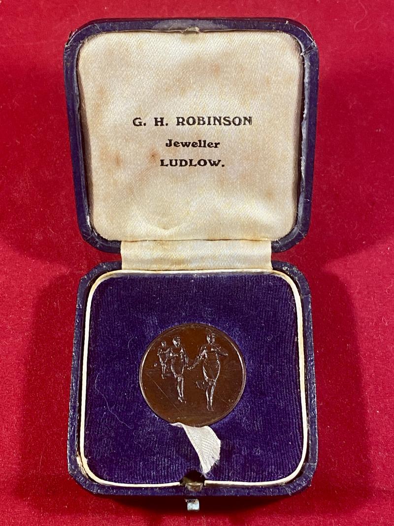 Cased Ludlow Grammer School Bronze Senior Relay Sports Medal to R.V. CHEESE 1935