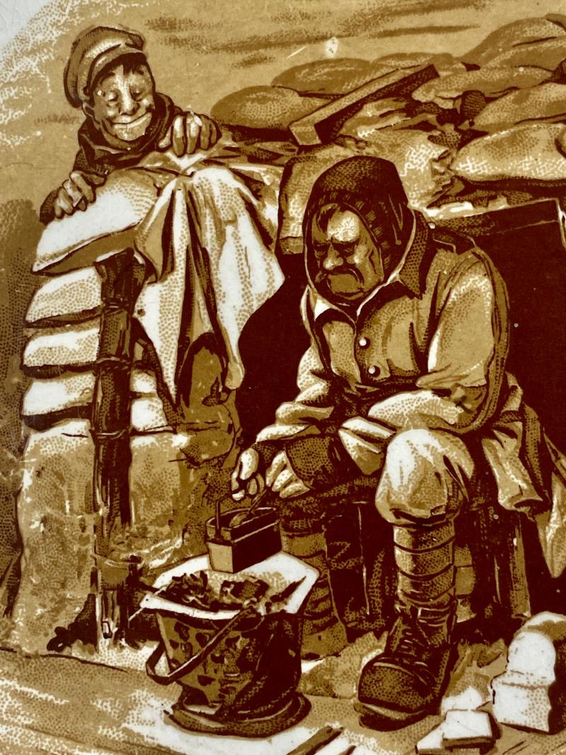 WW1 Bruce Bairnsfather 8.25” Commemorative Dish Depicting a Cooking Cartoon and the words THE HISTORICAL TOUCH – “WELL ALFRED OW ARE THE CAKES?”