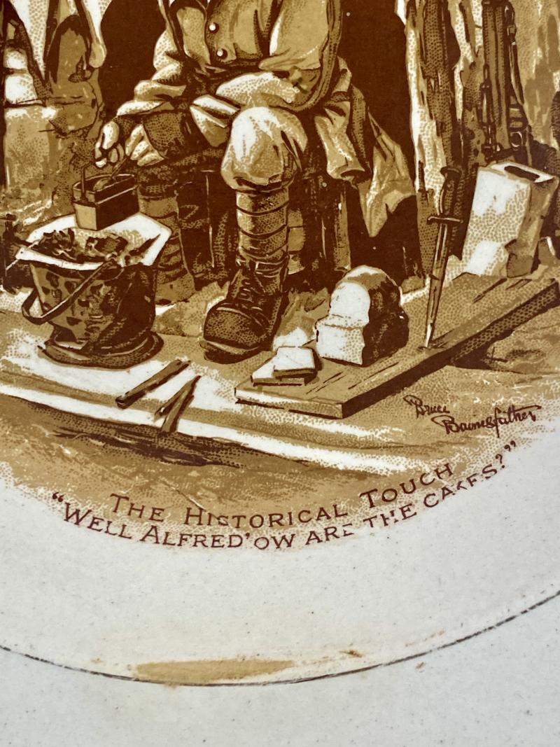WW1 Bruce Bairnsfather 8.25” Commemorative Dish Depicting a Cooking Cartoon and the words THE HISTORICAL TOUCH – “WELL ALFRED OW ARE THE CAKES?”