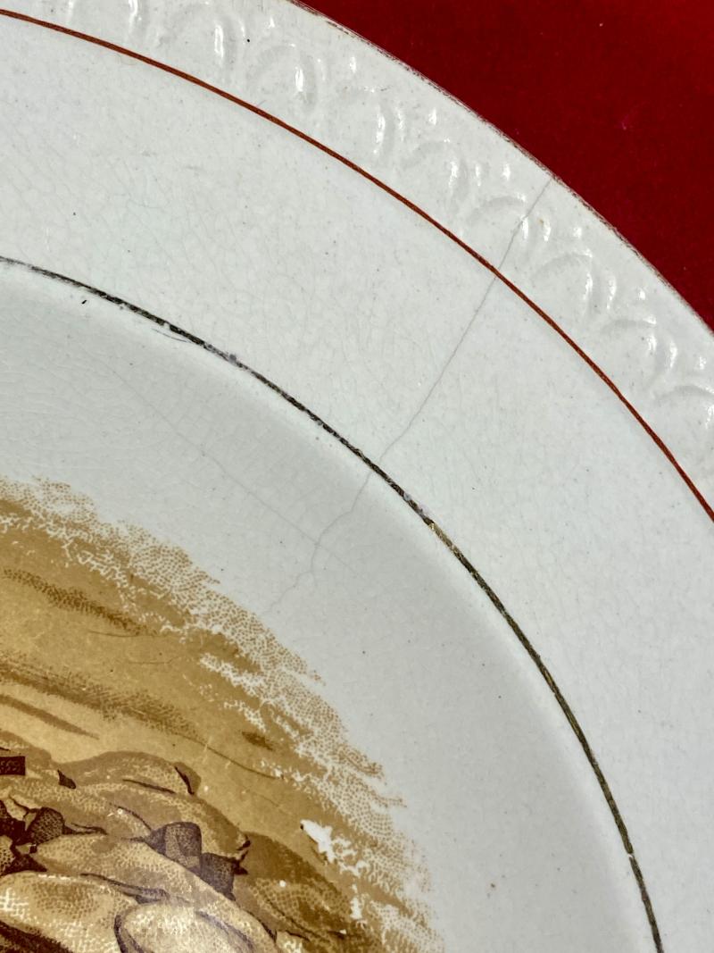 WW1 Bruce Bairnsfather 8.25” Commemorative Dish Depicting a Cooking Cartoon and the words THE HISTORICAL TOUCH – “WELL ALFRED OW ARE THE CAKES?”