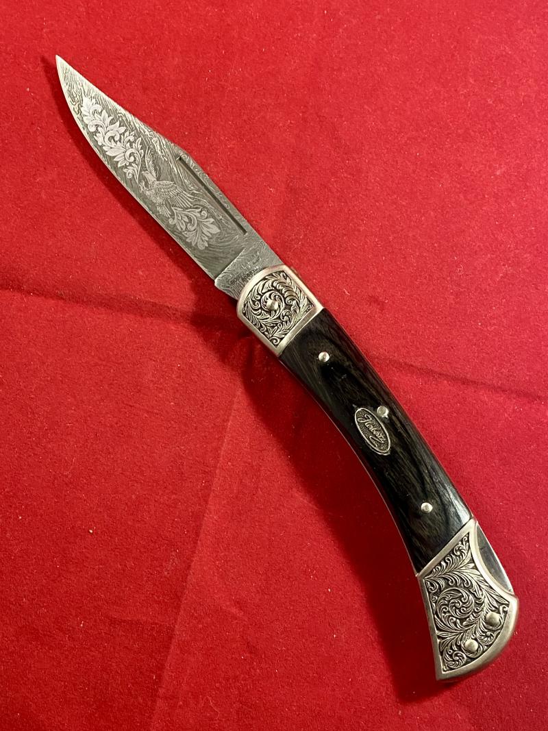 Stunning Vintage Folding Lock Knife with Damascus Blade Etched with an Eagle Scene by Herbertz Messer