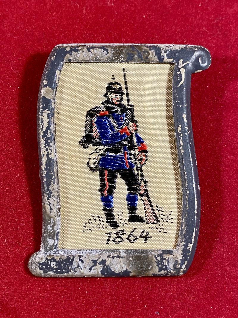 Nazi Period WHW Fund Raising Badge depicting a Prussian Soldier 1864 Embroidered in Silk