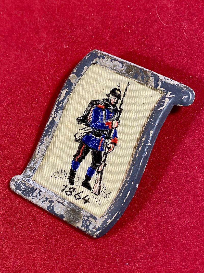 Nazi Period WHW Fund Raising Badge depicting a Prussian Soldier 1864 Embroidered in Silk
