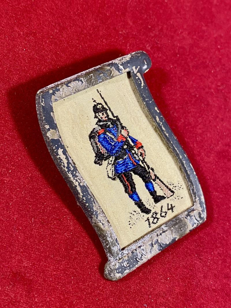 Nazi Period WHW Fund Raising Badge depicting a Prussian Soldier 1864 Embroidered in Silk