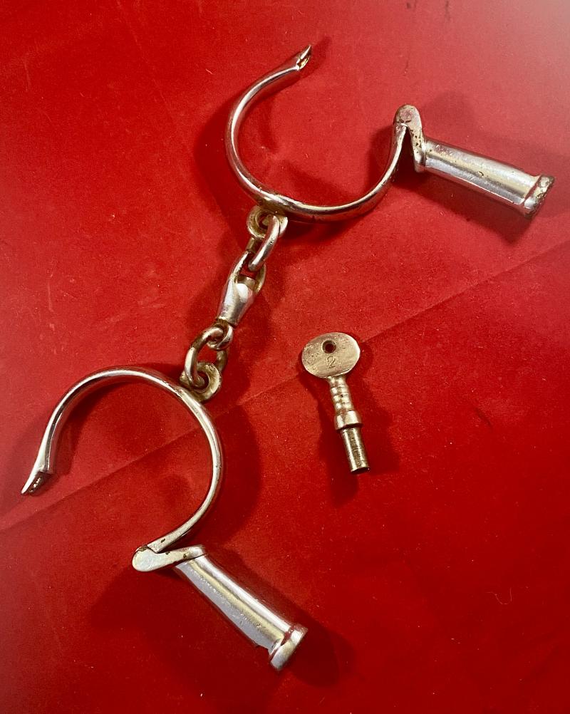 Pair of British Police Hiatt “D” Type Handcuffs with a Key c1920