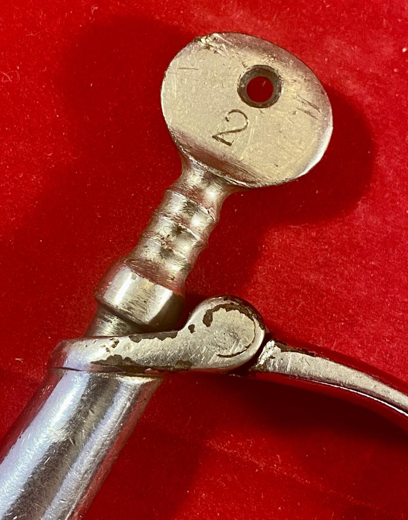 Pair of British Police Hiatt “D” Type Handcuffs with a Key c1920